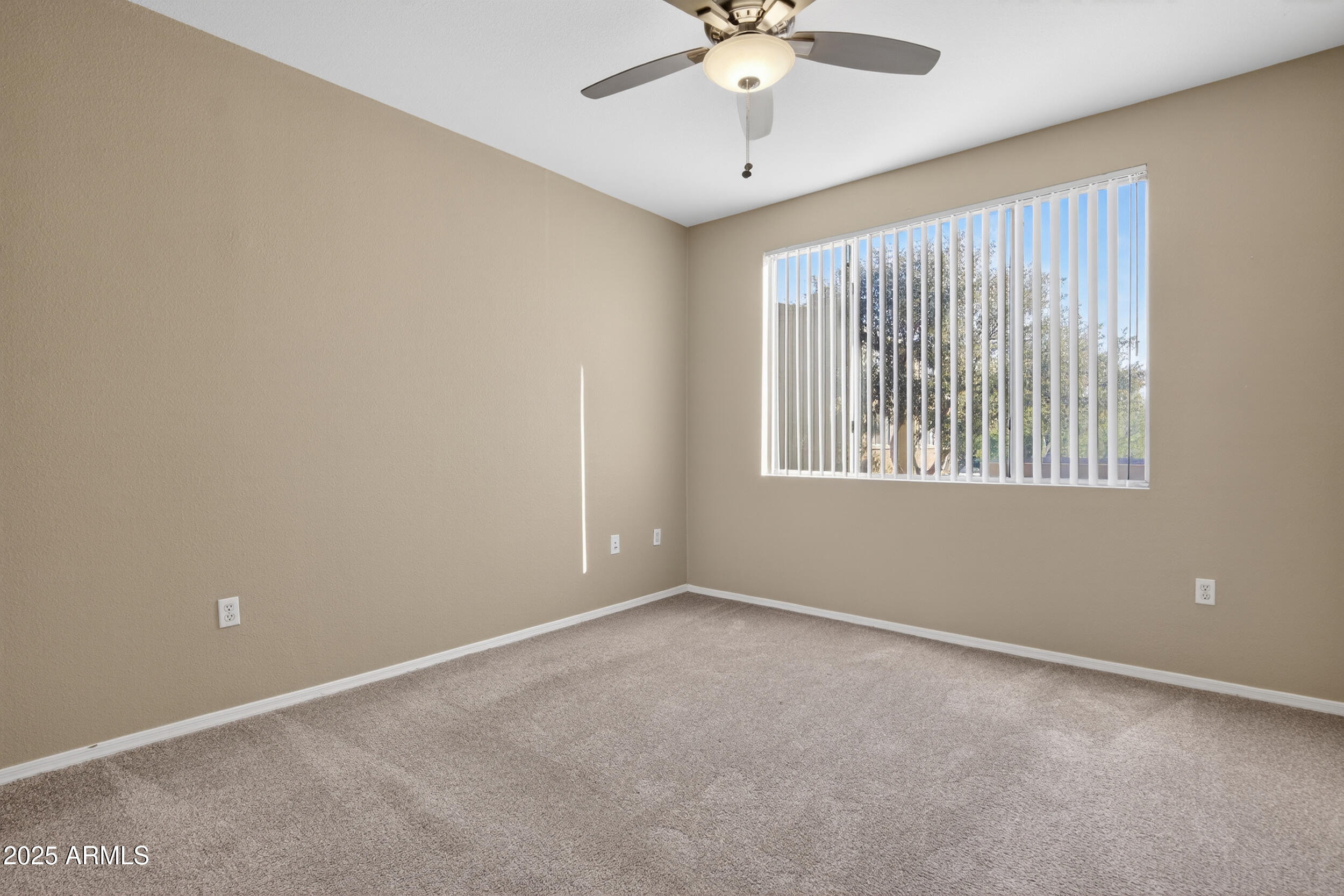 5401 East Van Buren Street, Unit 2022 Phoenix, AZ 85008 - Photo 13 of 37 an empty room with a window