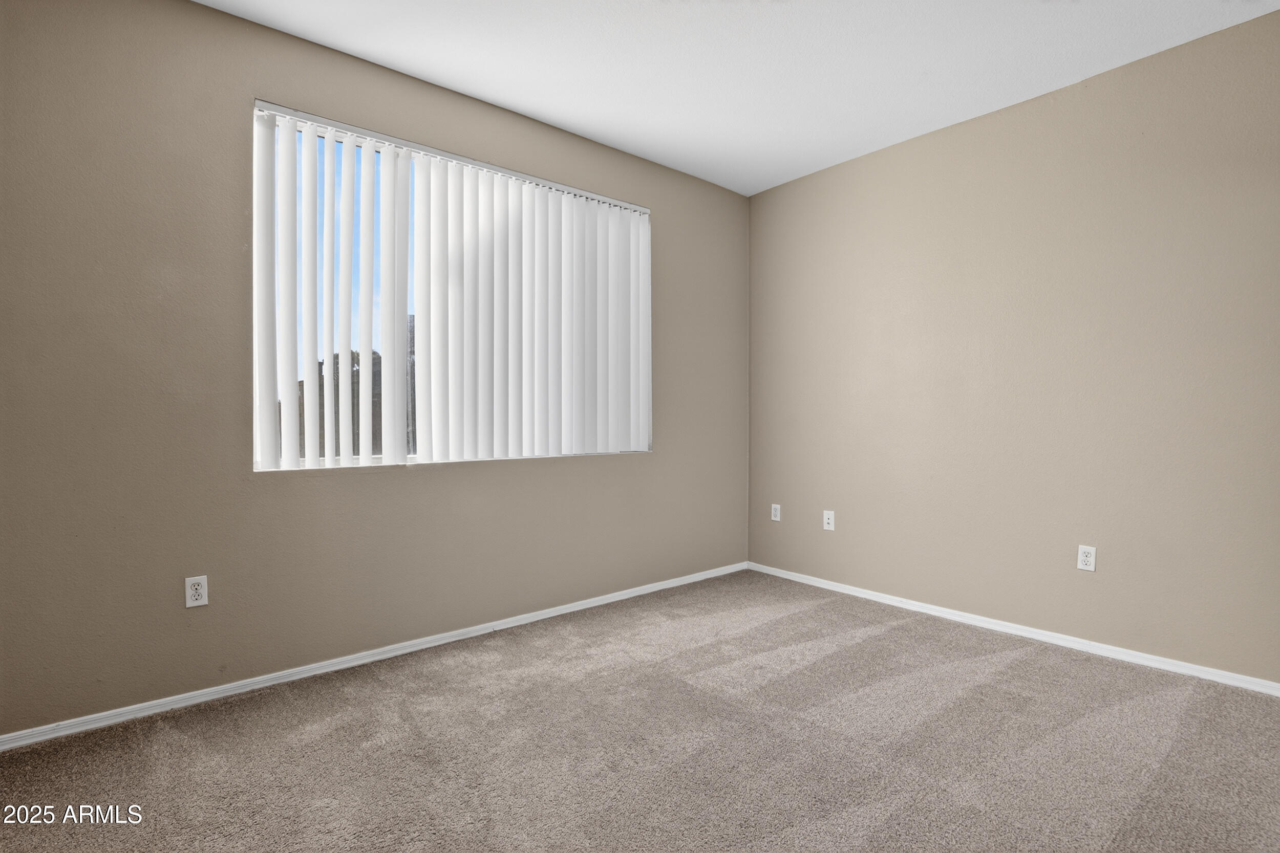 5401 East Van Buren Street, Unit 2022 Phoenix, AZ 85008 - Photo 17 of 37 an empty room with a window