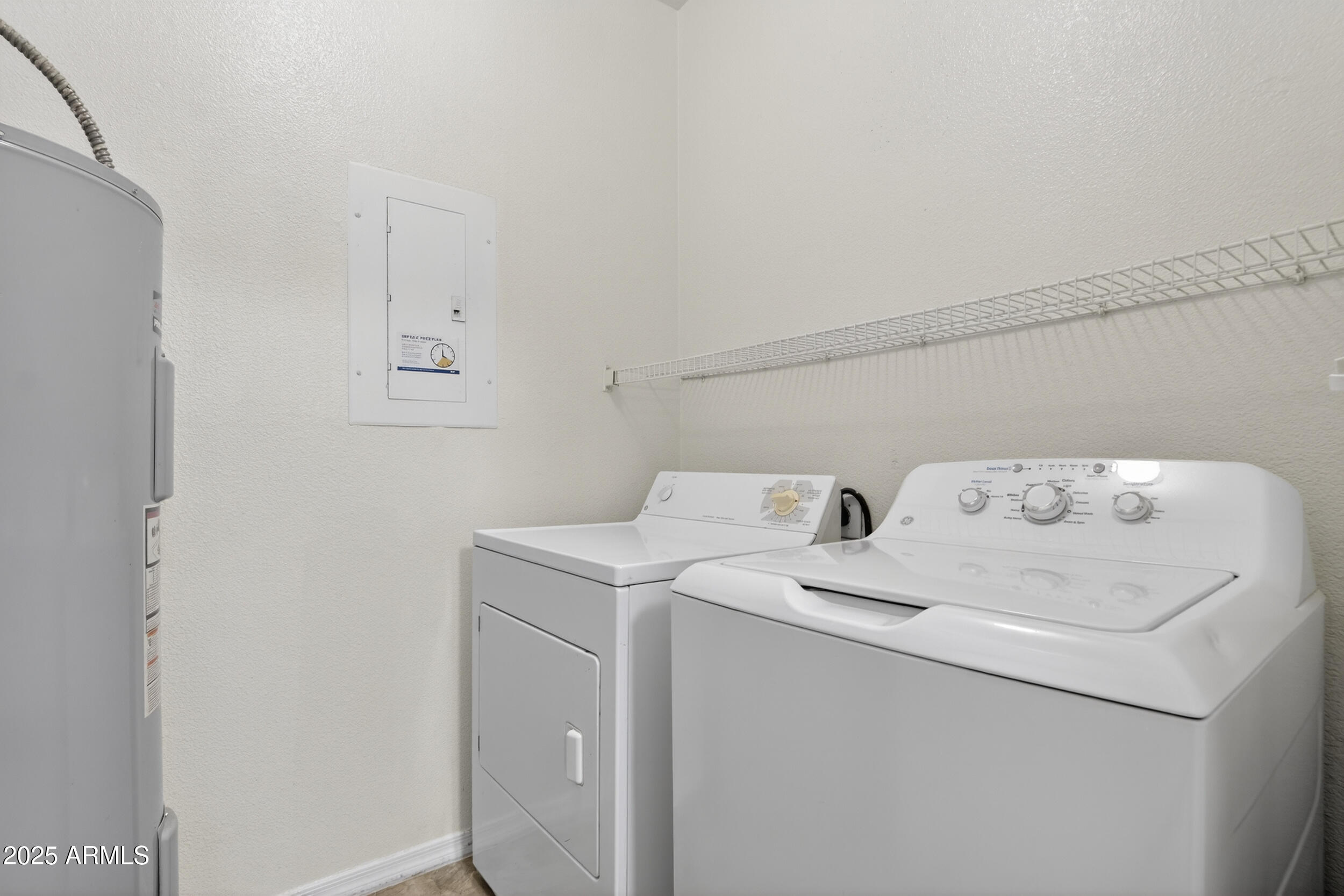 5401 East Van Buren Street, Unit 2022 Phoenix, AZ 85008 - Photo 22 of 37 a utility room with dryer and washer