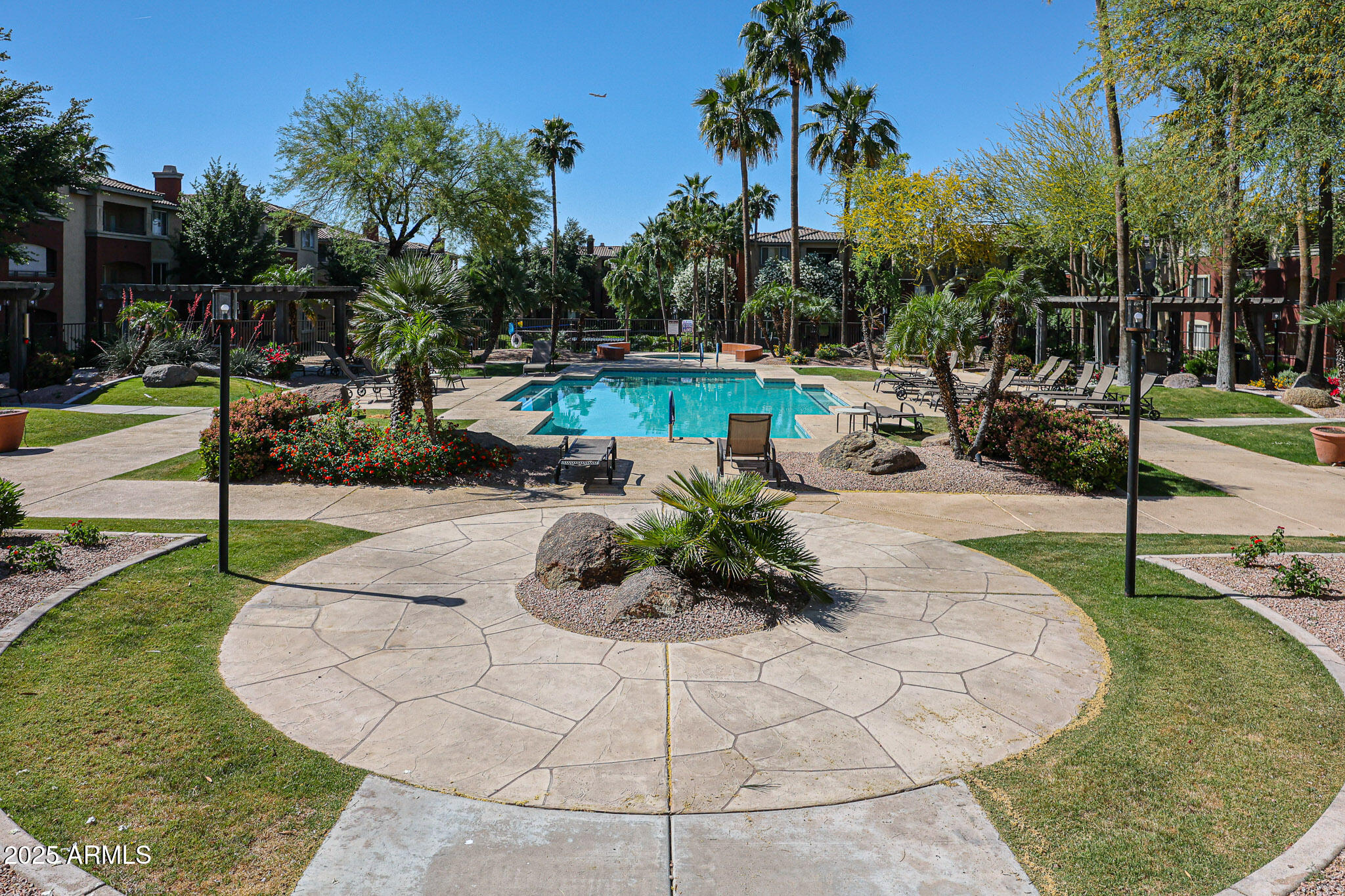 5401 East Van Buren Street, Unit 2022 Phoenix, AZ 85008 - Photo 26 of 37 a view of a swimming pool with a patio