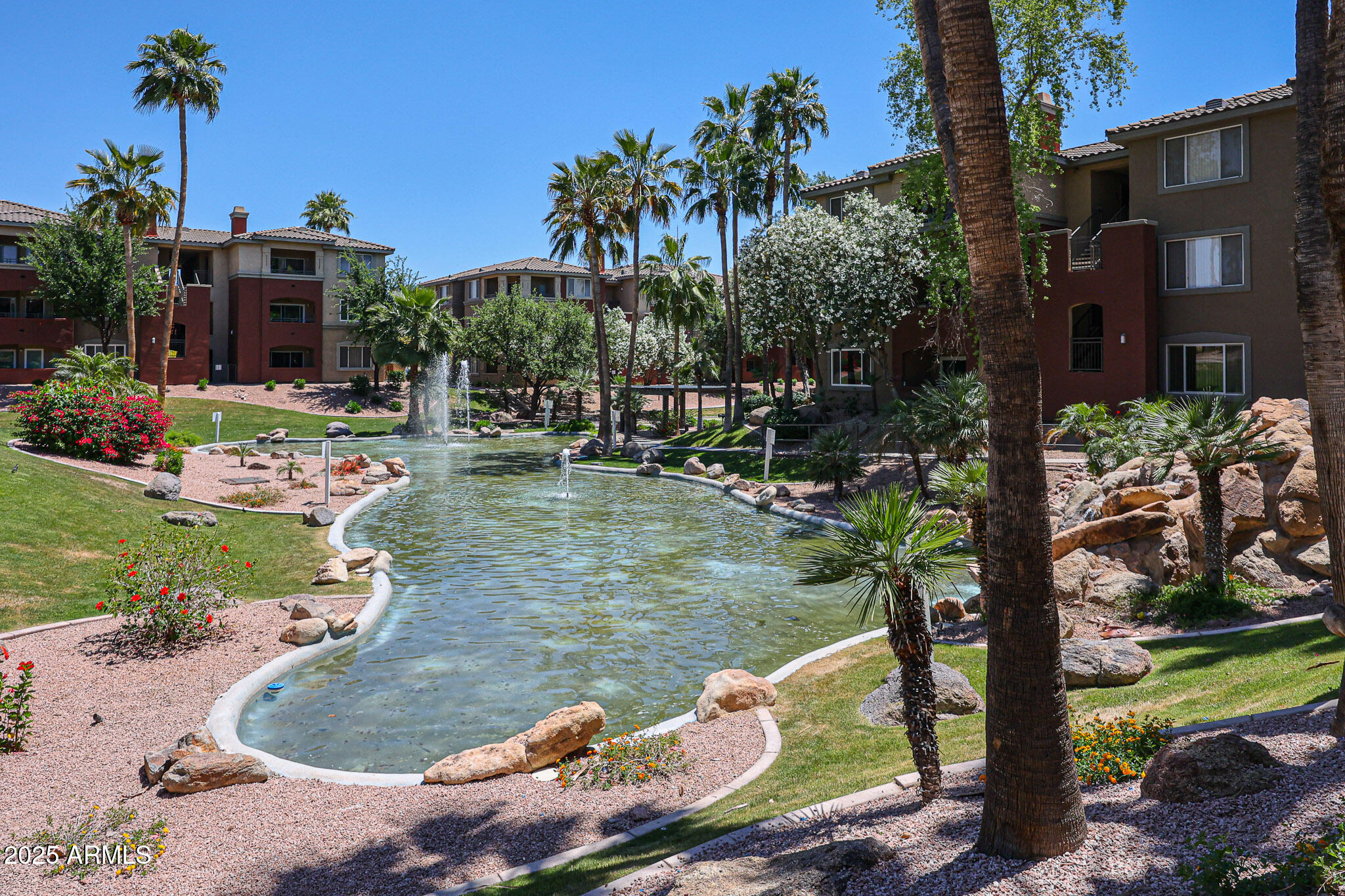 5401 East Van Buren Street, Unit 2022 Phoenix, AZ 85008 - Photo 29 of 37 a view of a wooden house with a yard