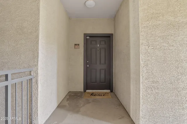 a kitchen with a refrigerator and a microwave