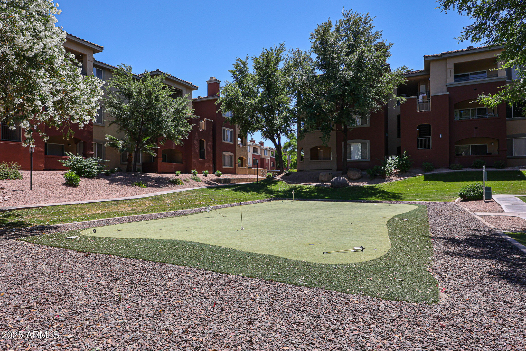 5401 East Van Buren Street, Unit 2022 Phoenix, AZ 85008 - Photo 31 of 37 a view of outdoor space with playground
