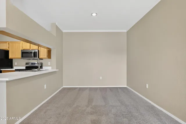 a view of a livingroom and a window