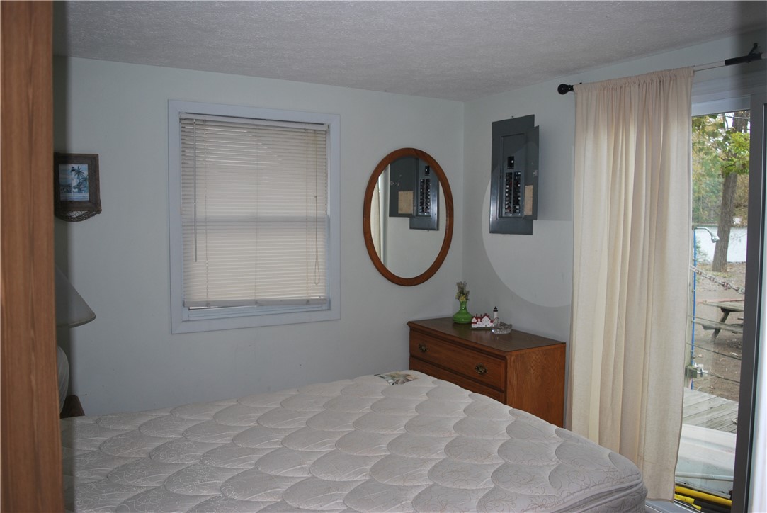 9294 Crescent Beach Wolcott, NY 14590 - Photo 13 of 48 2nd 1st floor bedroom