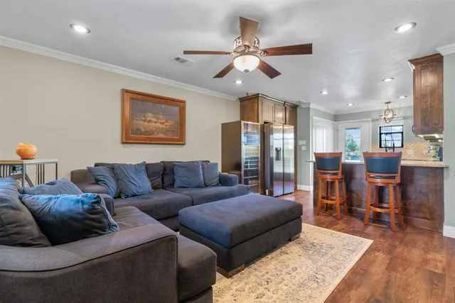 a living room with furniture and a table