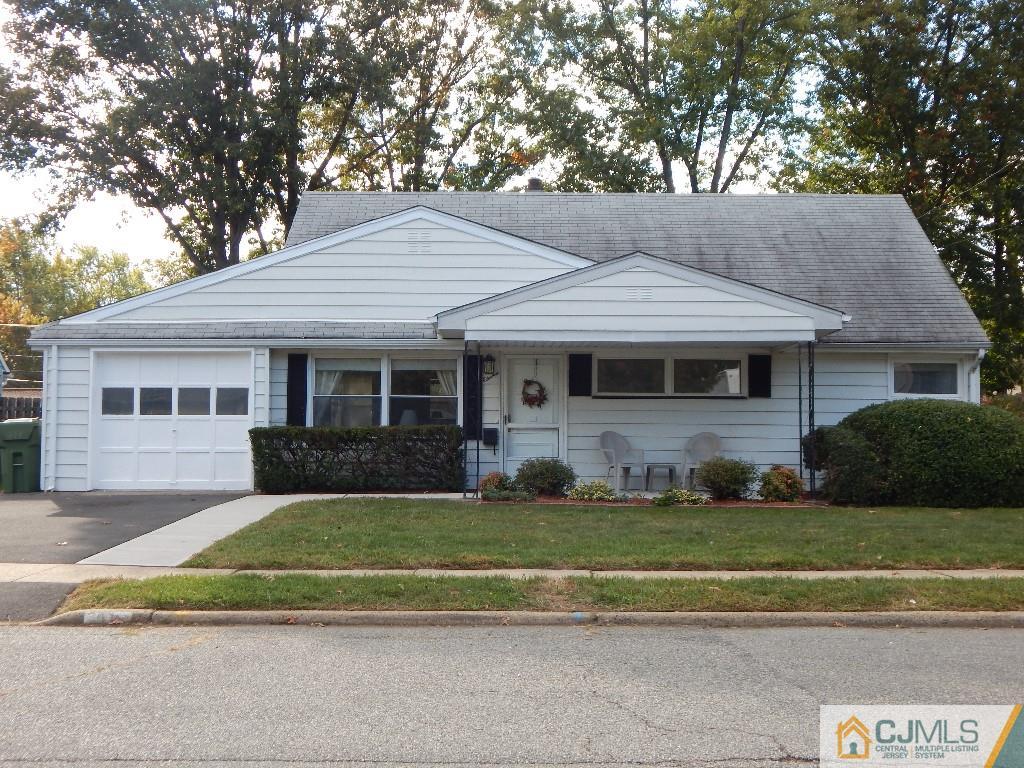 11 Dobson Road Edison, NJ 08817 - Photo 1 of 16 a front view of a house with a yard
