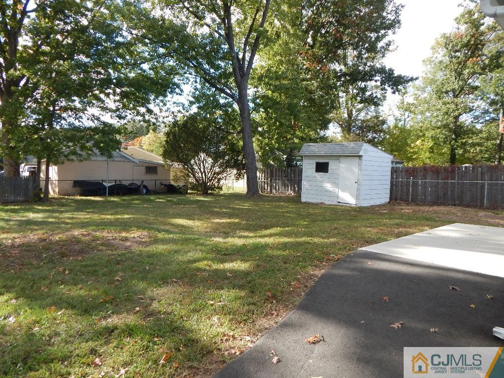 11 Dobson Road Edison, NJ 08817 - Photo 16 of 16 a front view of a house with a yard