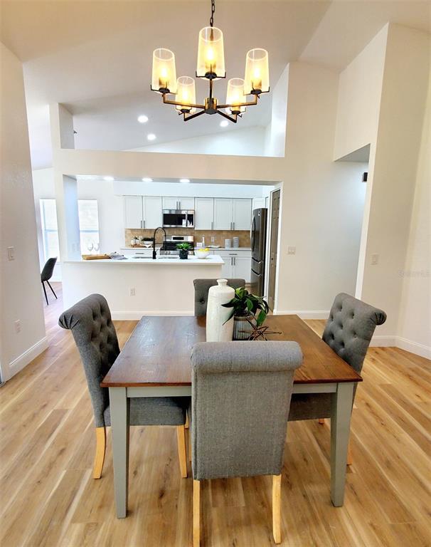 1517 Morning Rose Place Trinity, FL 34655 - Photo 11 of 50 a kitchen with granite countertop lots of counter top space