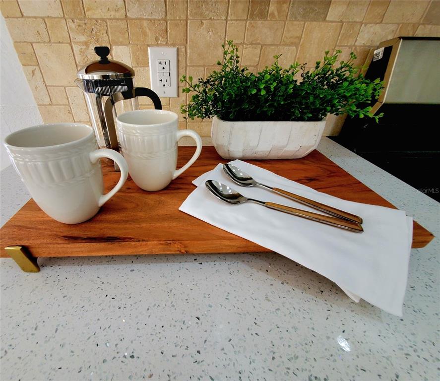 1517 Morning Rose Place Trinity, FL 34655 - Photo 16 of 50 a living room with furniture and flowers