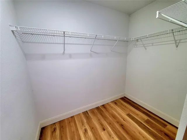 a view of a room with racks on the wall