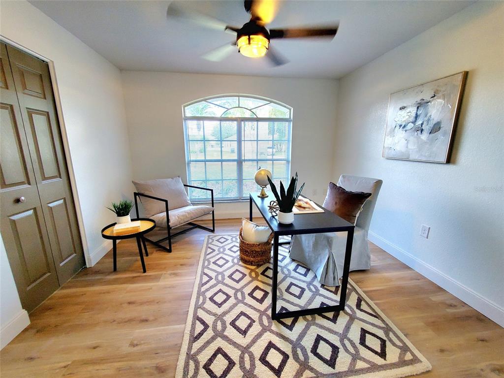1517 Morning Rose Place Trinity, FL 34655 - Photo 32 of 50 a living room with furniture and wooden floor