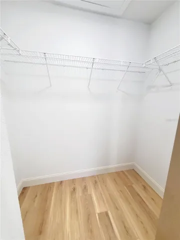 a view of a room with racks on the wall