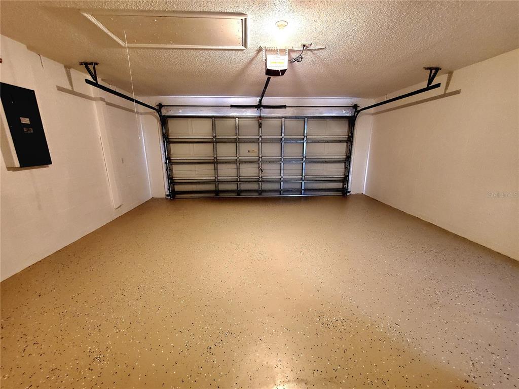 1517 Morning Rose Place Trinity, FL 34655 - Photo 41 of 50 a view of a garage