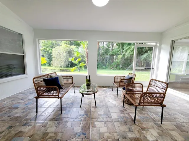 a living room filled with furniture