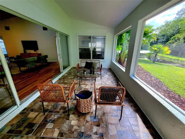 a view of a yard with a tree