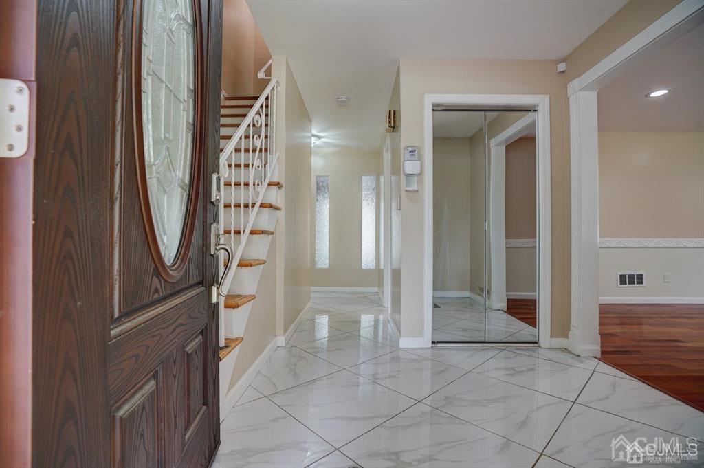 7 Calvert Avenue East Edison, NJ 08820 - Photo 10 of 47 a view of entryway with a bath tub and shower