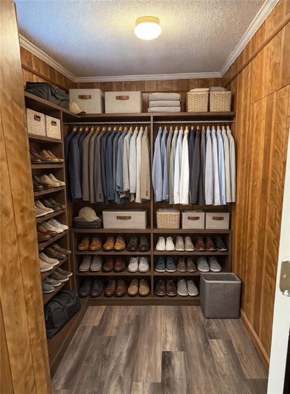 123 Mayview Lane Sandersville, GA 31082 - Photo 21 of 28 a view of walk in closet with clothes and shoes