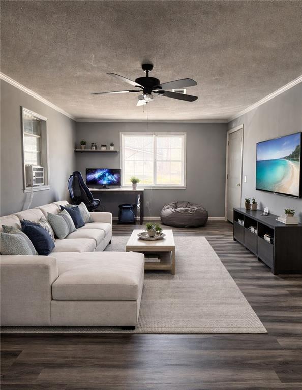 123 Mayview Lane Sandersville, GA 31082 - Photo 24 of 28 a living room with furniture and a flat screen tv