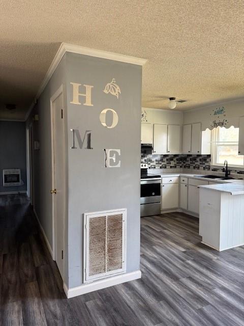 123 Mayview Lane Sandersville, GA 31082 - Photo 27 of 28 a kitchen with granite countertop stainless steel appliances and wooden cabinets