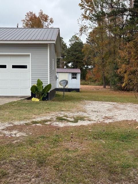 123 Mayview Lane Sandersville, GA 31082 - Photo 4 of 20 a view of a house with a yard