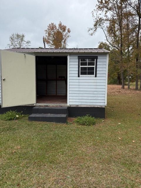 123 Mayview Lane Sandersville, GA 31082 - Photo 8 of 20 a front view of a house with a yard