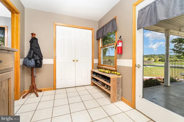 a view of living room with furniture and a window