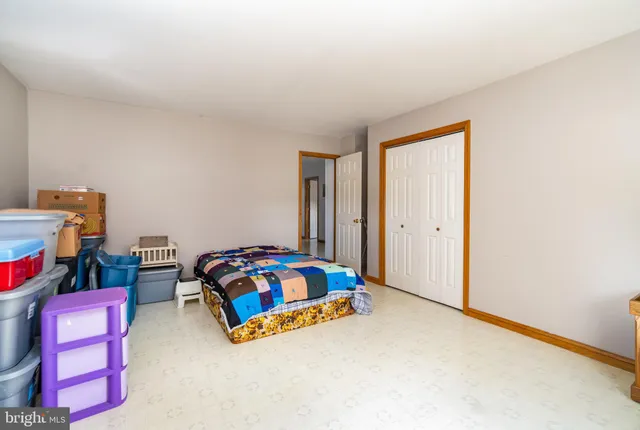 a view of a studio with wooden floor