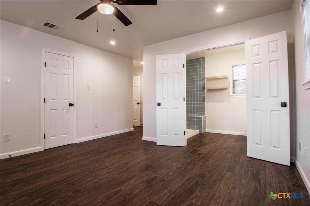 2019 South 9th Street Temple, TX 76504 - Photo 18 of 23 Primary bedroom looking towards bathroom