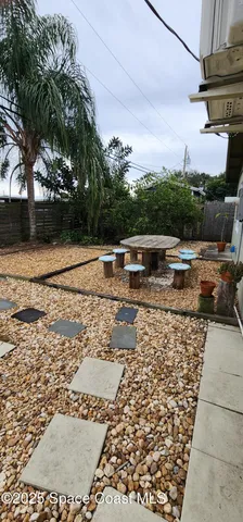 a view of a swimming pool with a yard