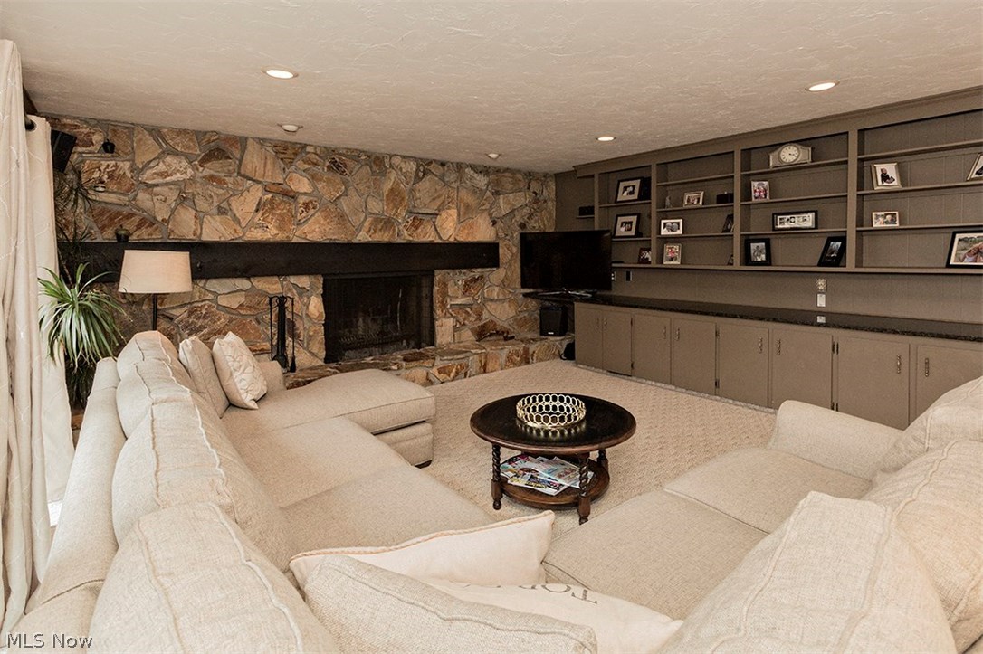 2612 Fenwick Road Cleveland, OH 44118 - Photo 11 of 31 Family room has a beautiful stone gas fireplace and tons of built in cabnitery
