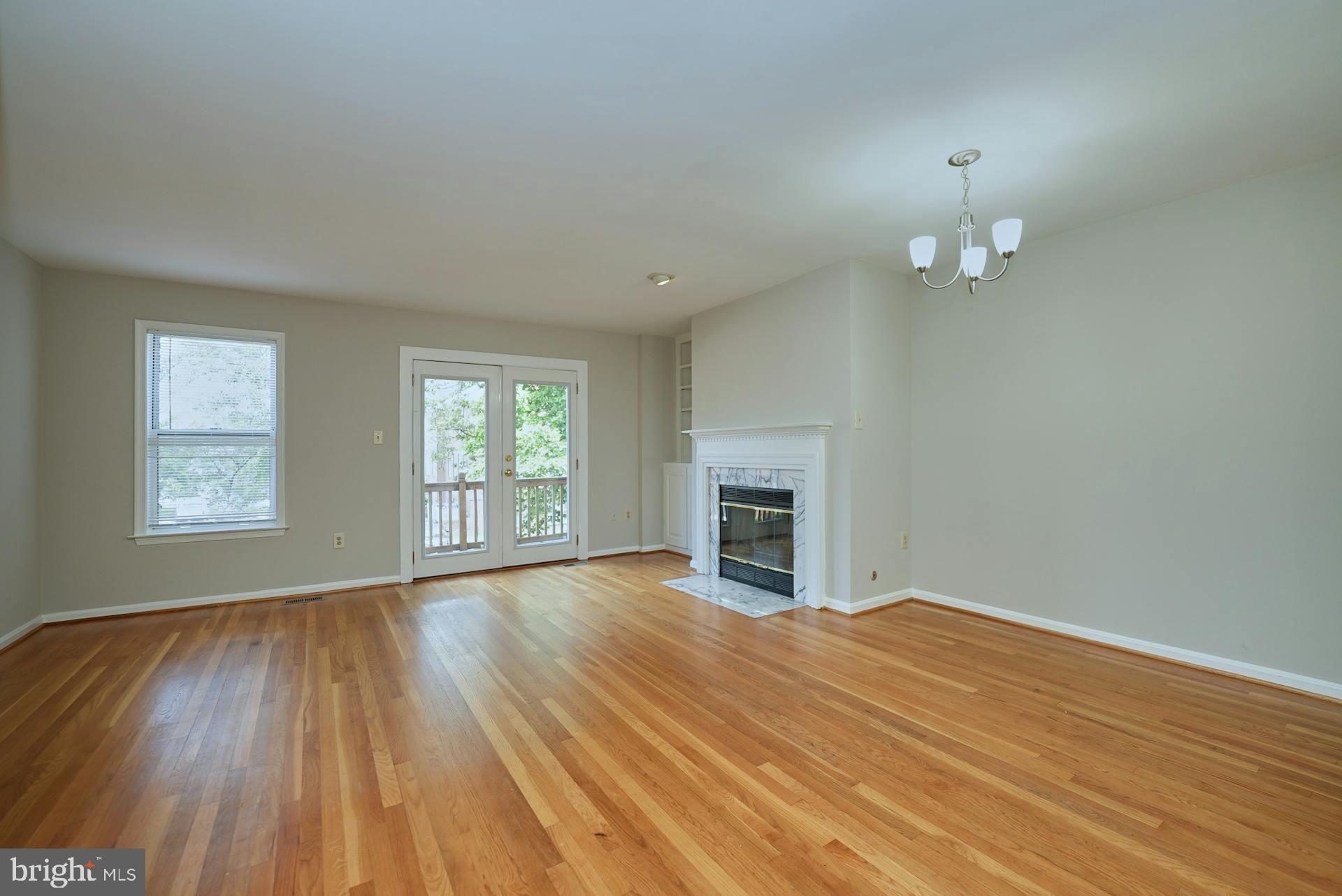 6320 Over See Court Springfield, VA 22152 - Photo 4 of 30 Family room w/gas fireplace and balcony access.