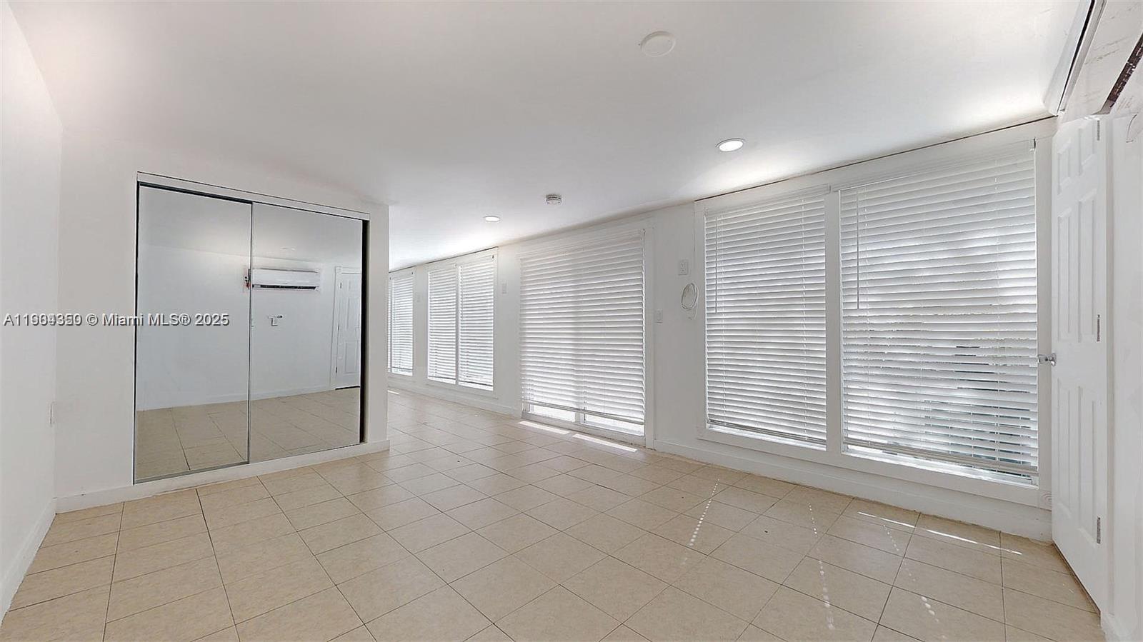 15704 Southwest 302nd Terrace Homestead, FL 33033 - Photo 17 of 26 a view of an empty room with a window