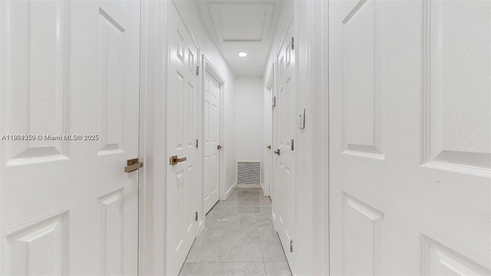 15704 Southwest 302nd Terrace Homestead, FL 33033 - Photo 4 of 26 a view of a hallway