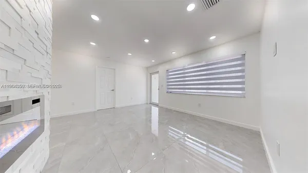 a kitchen with a stove and a microwave