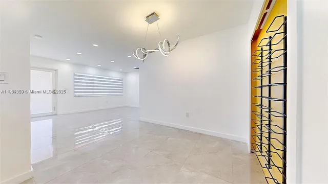 a view of a room with windows