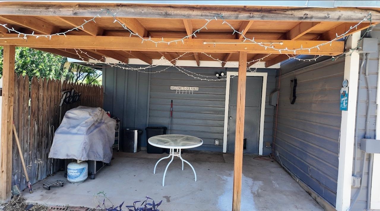 2709 Rice Avenue San Angelo, TX 76904 - Photo 27 of 28 a view of a patio with a table and chairs