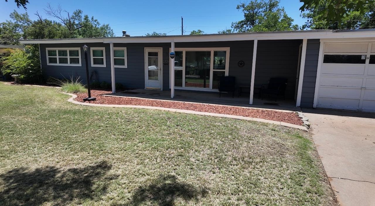 2709 Rice Avenue San Angelo, TX 76904 - Photo 3 of 28 front view of a house with a yard