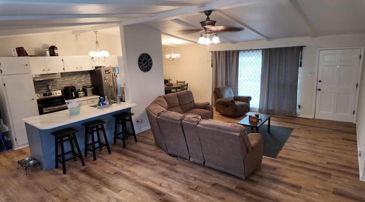 2709 Rice Avenue San Angelo, TX 76904 - Photo 6 of 28 a living room with furniture and a fireplace