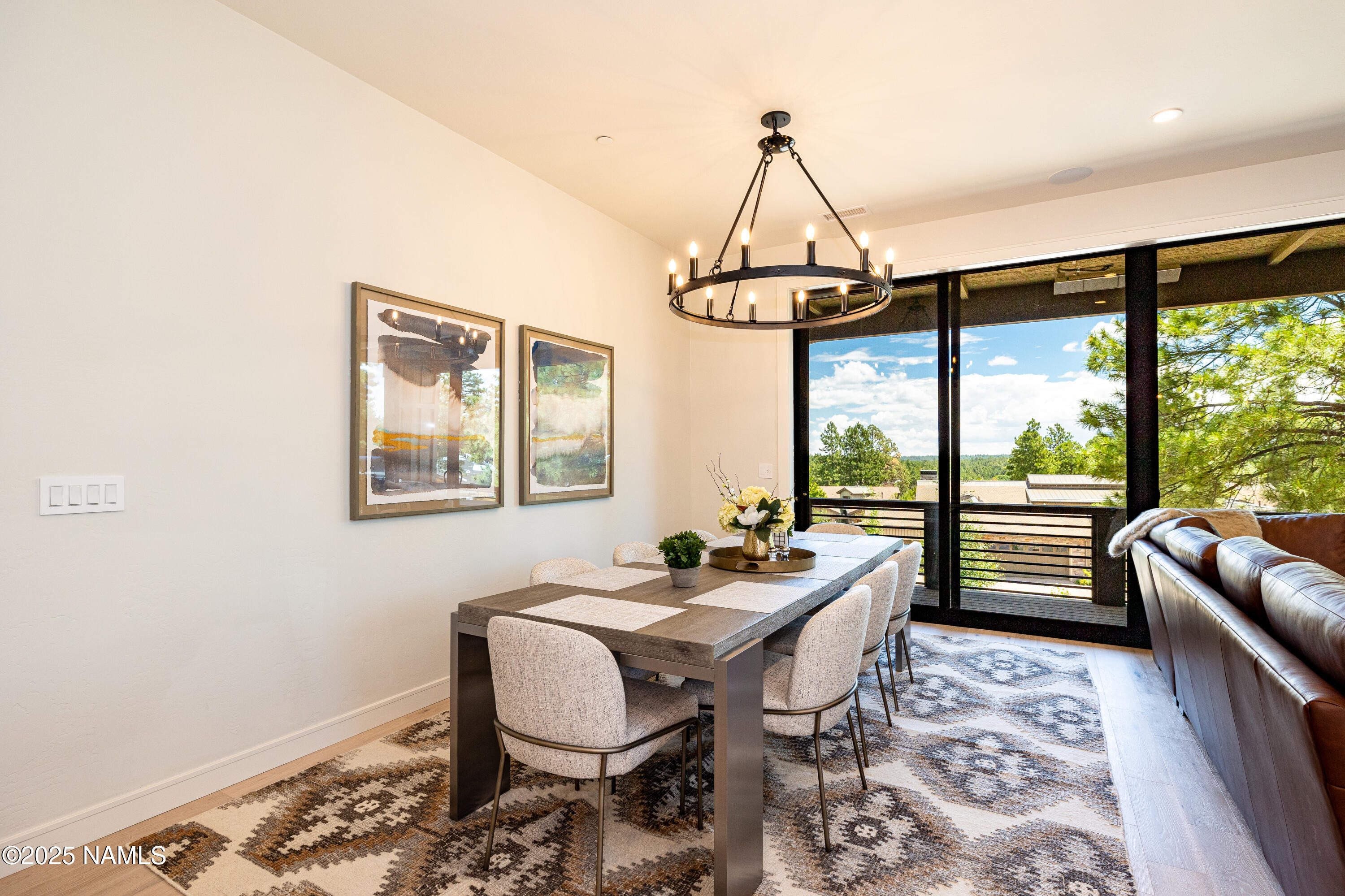 3001 South Tourmaline Drive, Unit 28 Flagstaff, AZ 86005 - Photo 13 of 41 a dining room with furniture and window