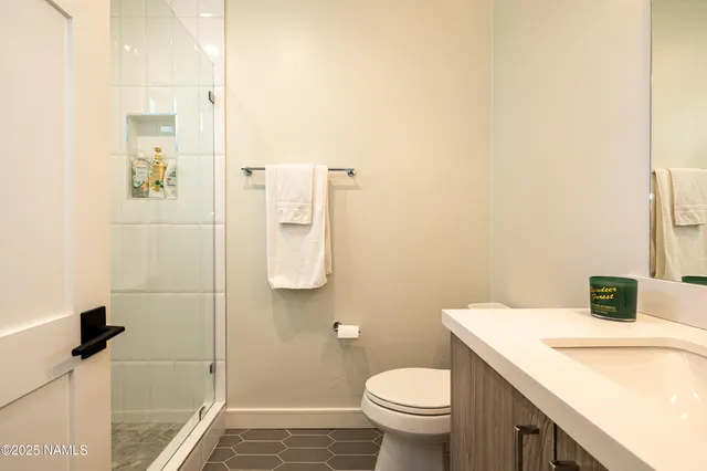 a bathroom with a tub and shower