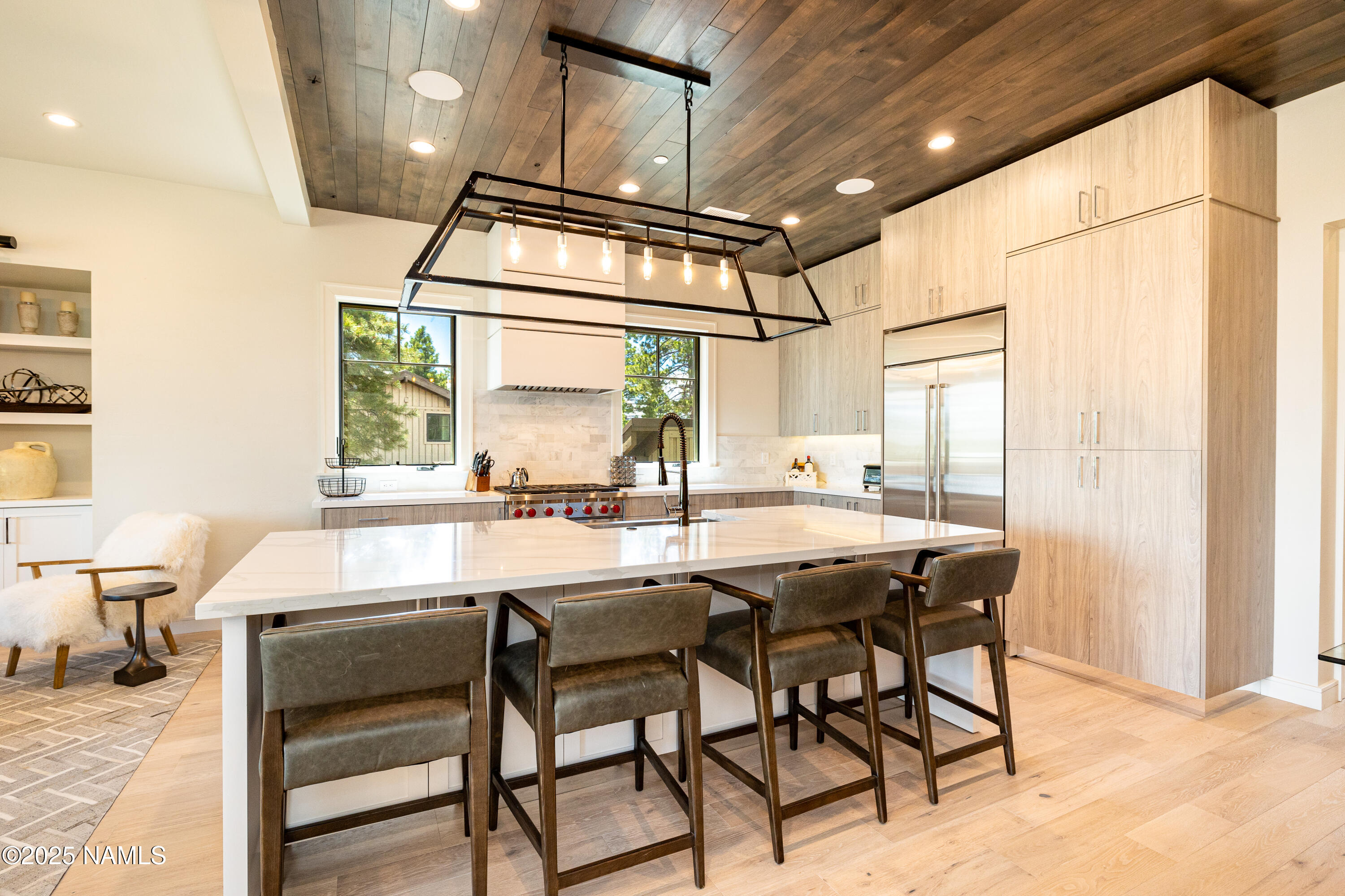 3001 South Tourmaline Drive, Unit 28 Flagstaff, AZ 86005 - Photo 2 of 41 a kitchen with a table chairs and window
