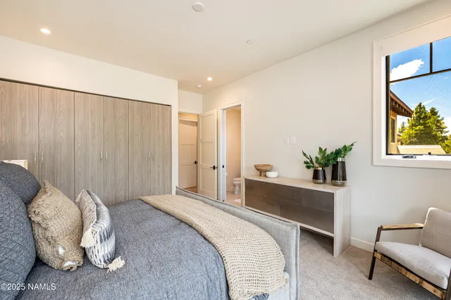 a view of a balcony with wooden floor
