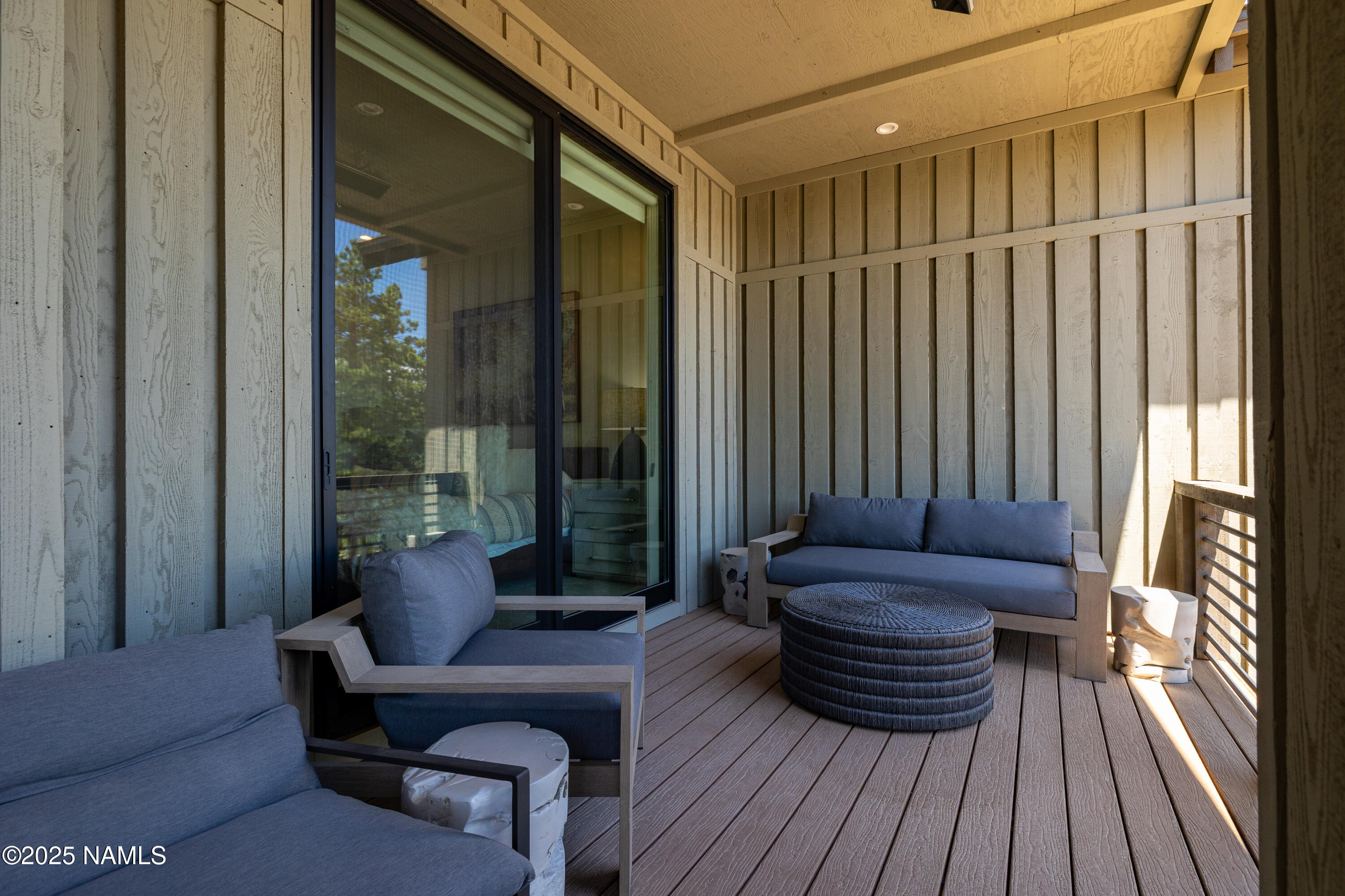 3001 South Tourmaline Drive, Unit 28 Flagstaff, AZ 86005 - Photo 30 of 41 a living room with furniture and a large window