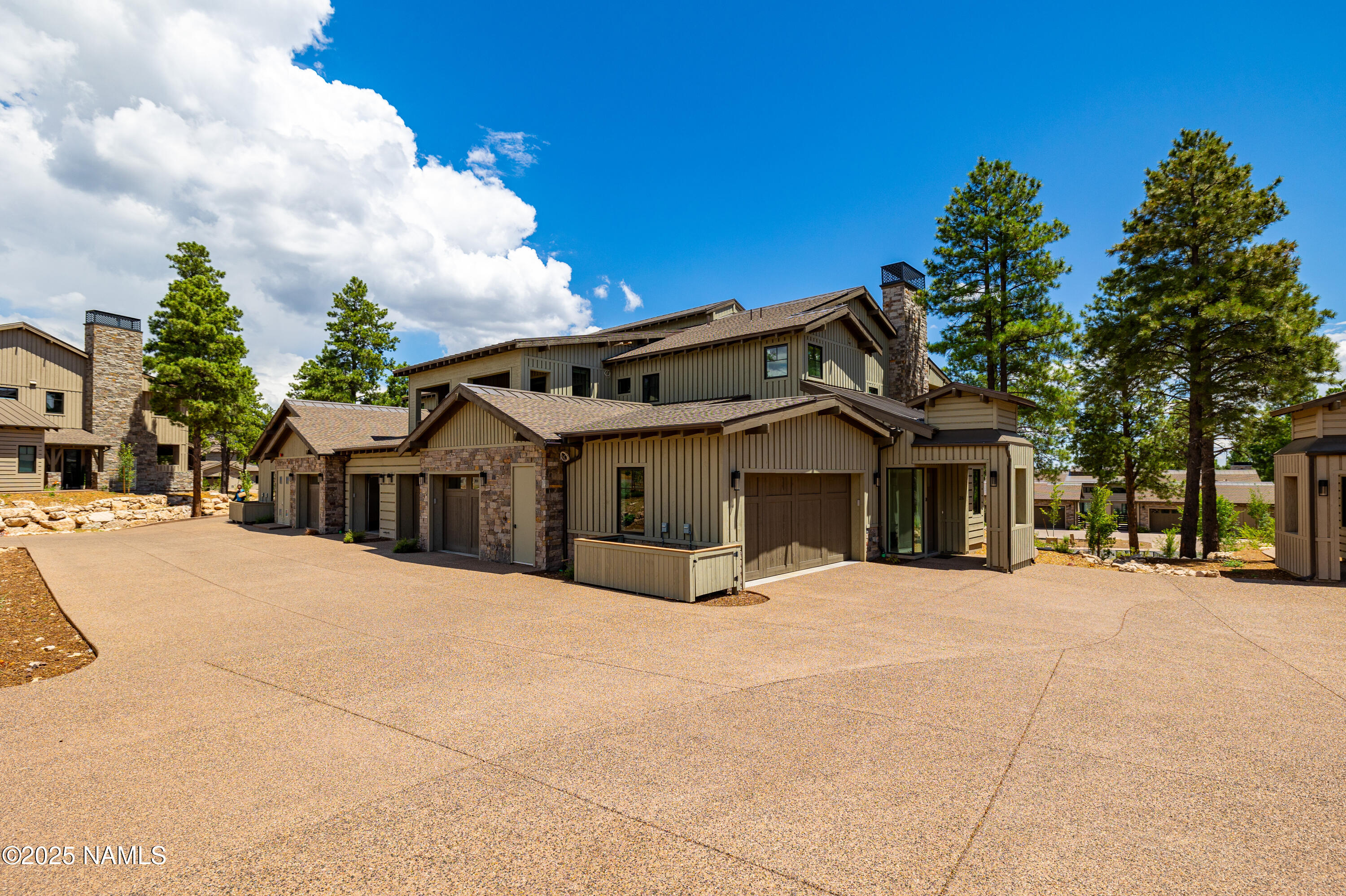 3001 South Tourmaline Drive, Unit 28 Flagstaff, AZ 86005 - Photo 39 of 41 a view of house with outdoor space and trees around