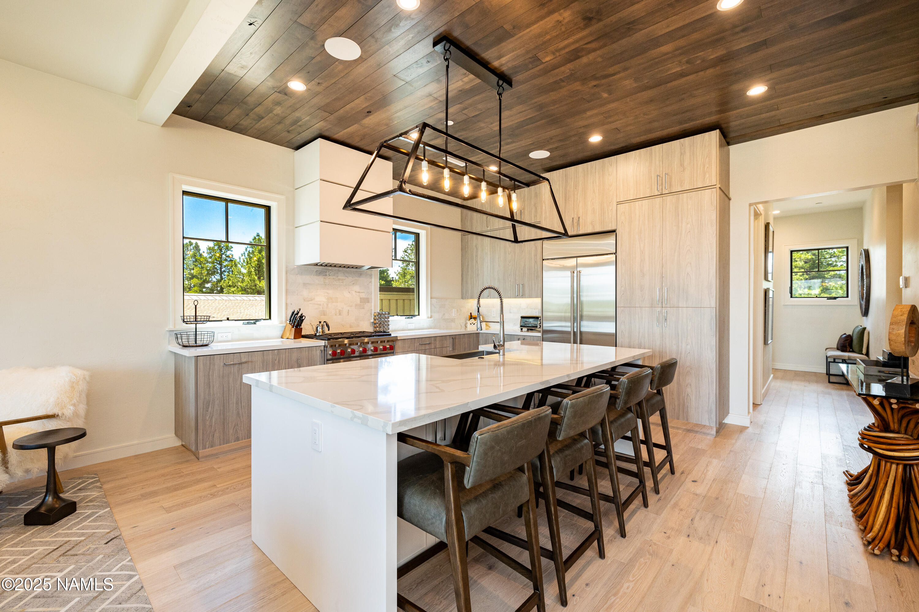 3001 South Tourmaline Drive, Unit 28 Flagstaff, AZ 86005 - Photo 8 of 41 a large kitchen with a table and chairs in it