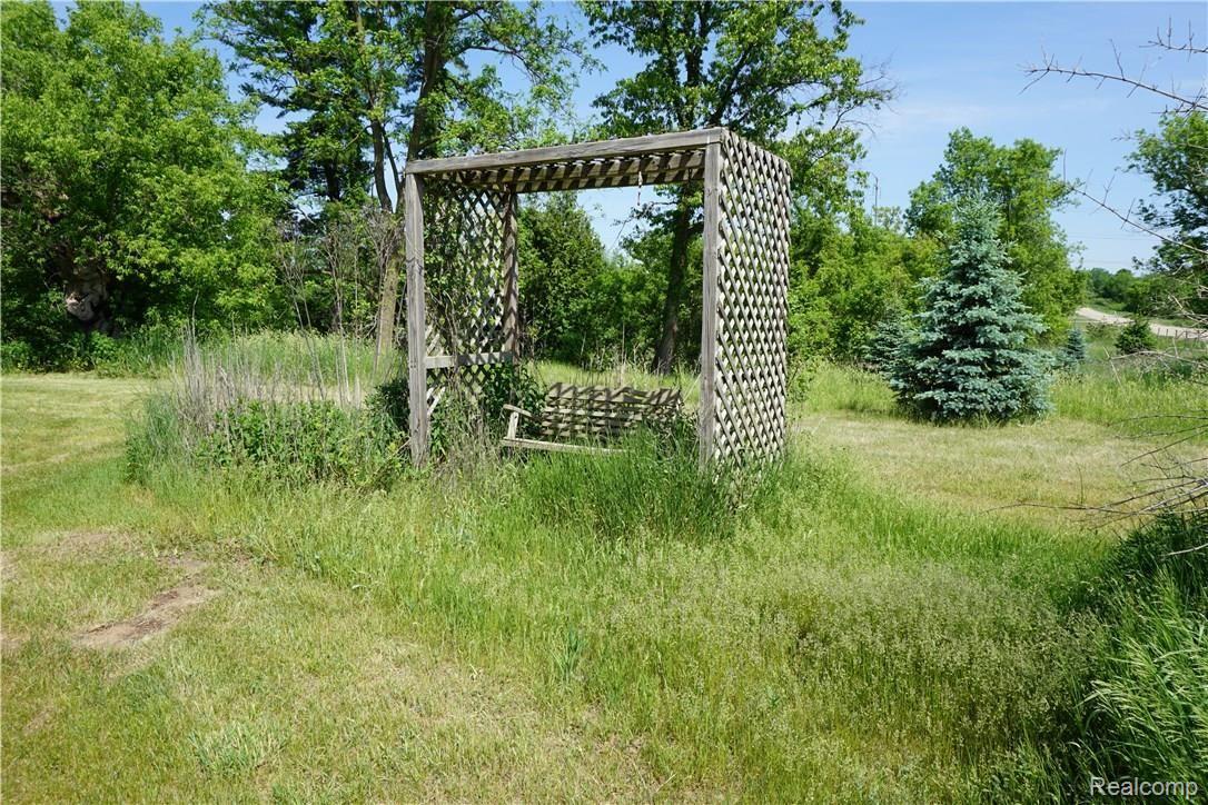 10253 Byron Road Howell, MI 48855 - Photo 34 of 35 Lonely Swing, waiting for you.