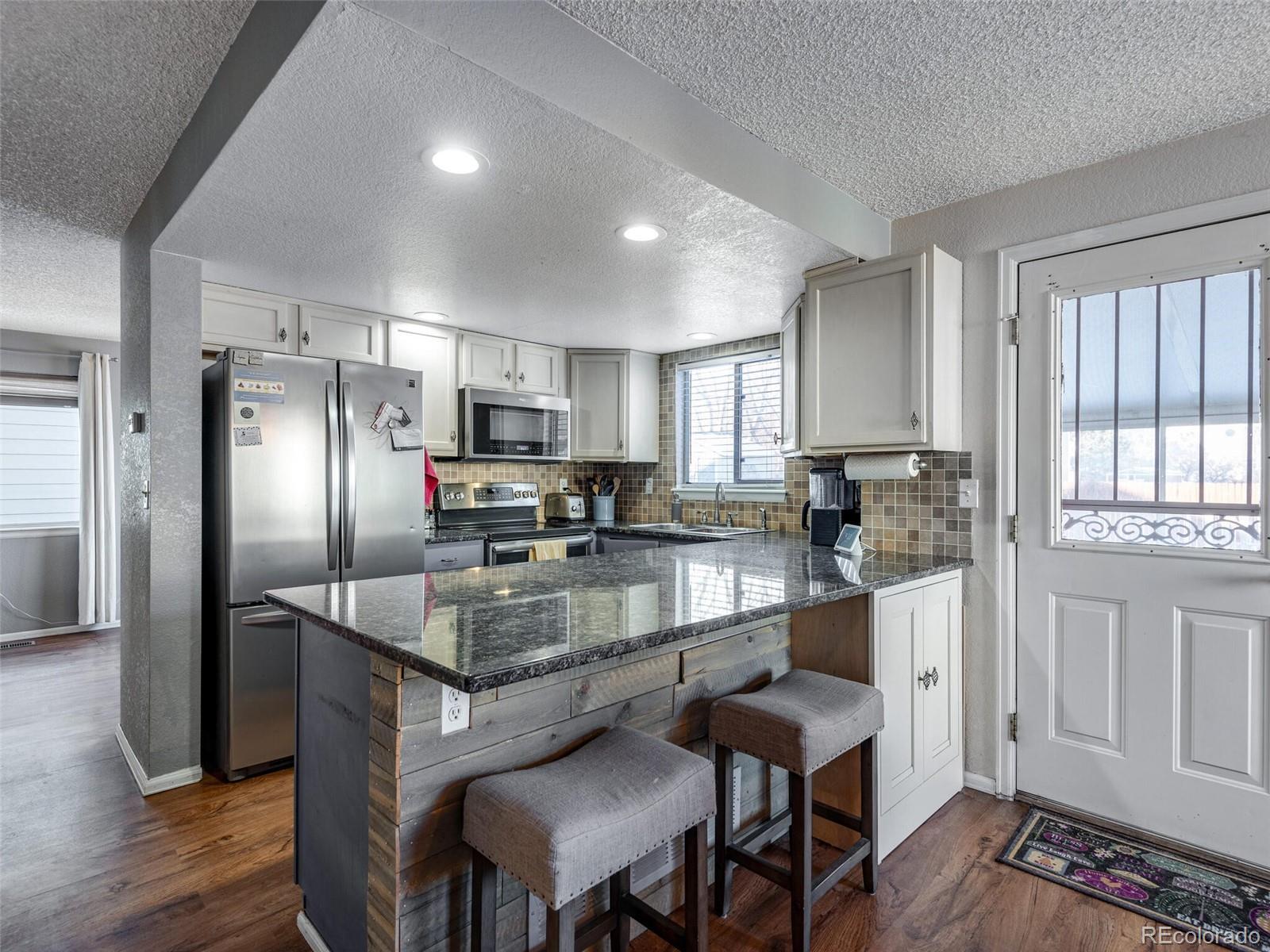 2401 Cherry Circle Brighton, CO 80601 - Photo 6 of 39