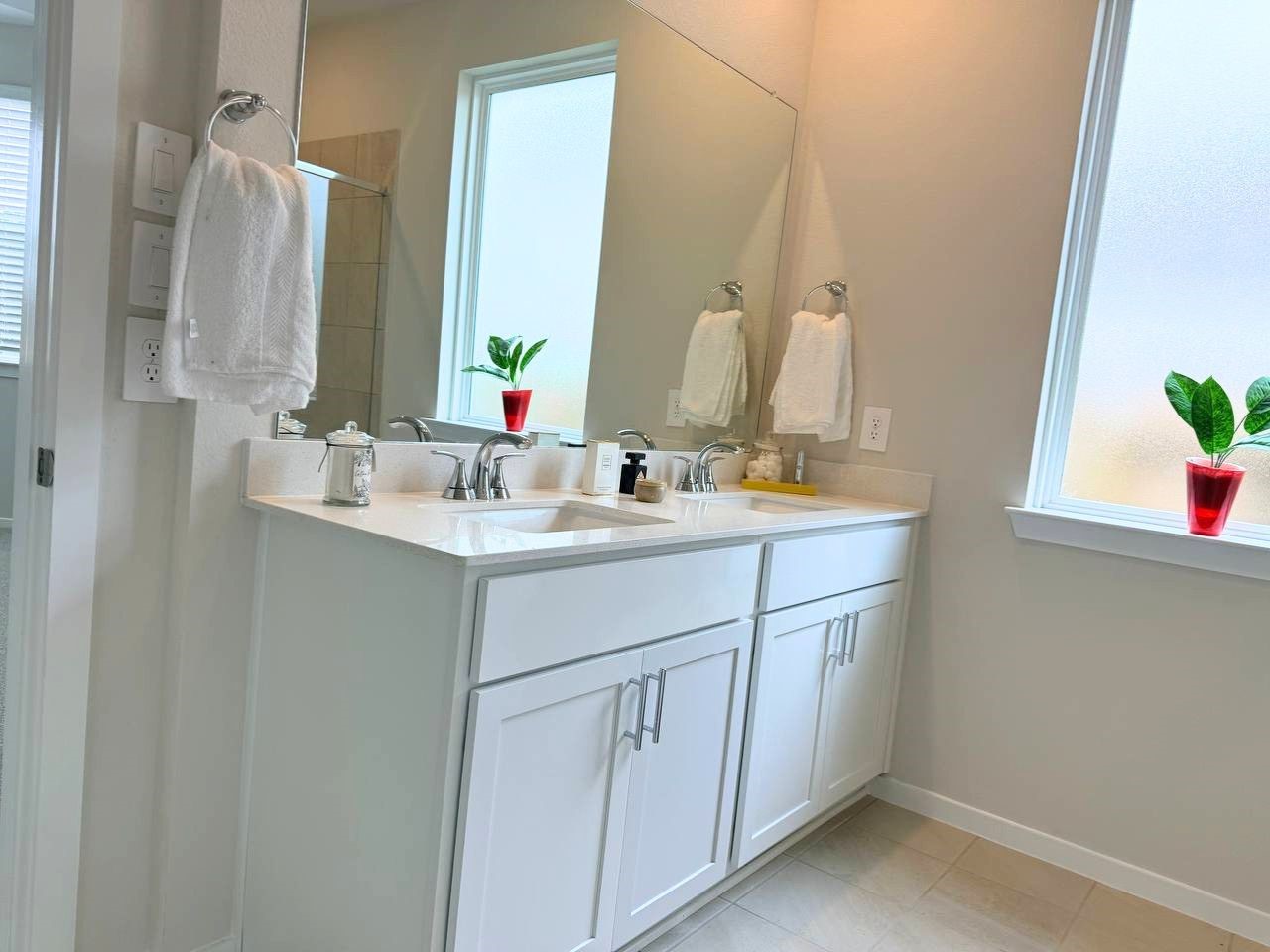 16246 Parish Pointe Court Conroe, TX 77302 - Photo 23 of 32 a bathroom with a sink vanity and a mirror