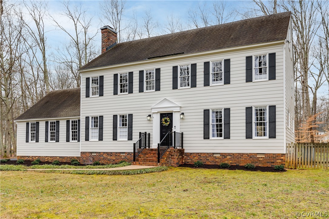 3180 East Brigstock Road Midlothian, VA 23113 - Photo 2 of 50 a view of a house with swimming pool next to a yard